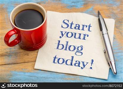 Start your blog today - handwriting on a napkin with a cup of espresso coffee
