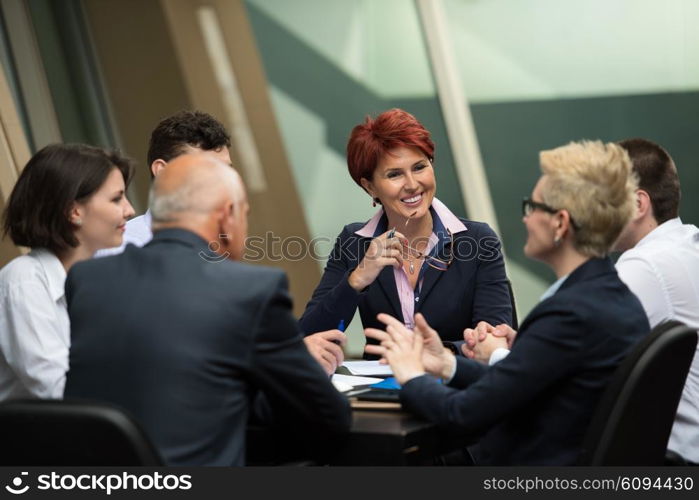 startup business people group have meeting in modern bright office interior, senoir investors and young software developers