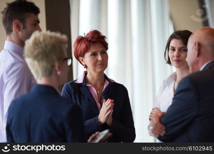 startup business people group have meeting in modern bright office interior, senoir investors and young software developers