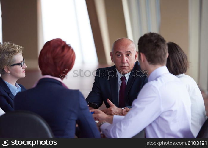 startup business people group have meeting in modern bright office interior, senoir investors and young software developers