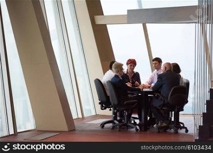 startup business people group have meeting in modern bright office interior, senoir investors and young software developers