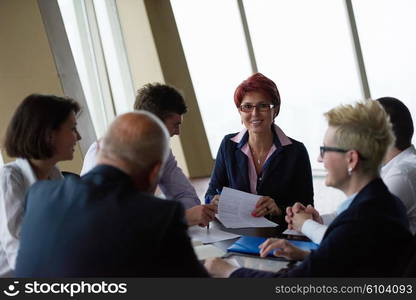 startup business people group have meeting in modern bright office interior, senoir investors and young software developers sign contract