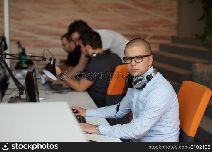 startup business, software developer working on computer at modern office