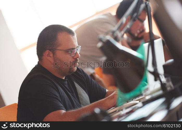 startup business, software developer working on computer at modern office