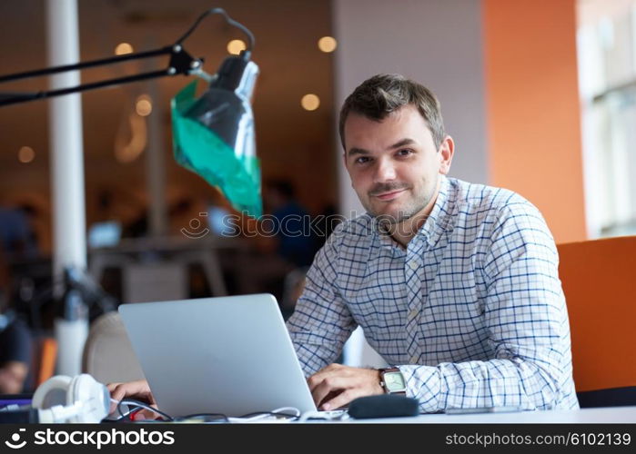 startup business, software developer working on computer at modern office