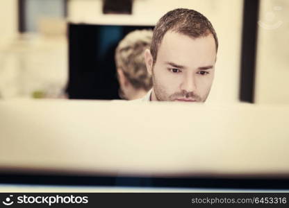 startup business, software developer working on desktop computer at modern office