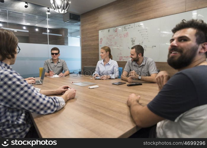 startup business team brainstorming on meeting working on laptop and tablet computer