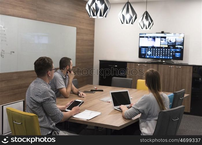 startup business team brainstorming on meeting working on laptop and tablet computer