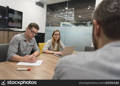 startup business team brainstorming on meeting working on laptop and tablet computer