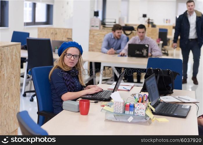 startup business, woman working on laptop computer at modern office