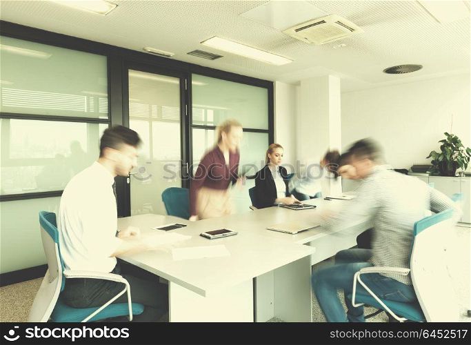 startup business, young creative people group entering meeting room, modern office interior and motion blur