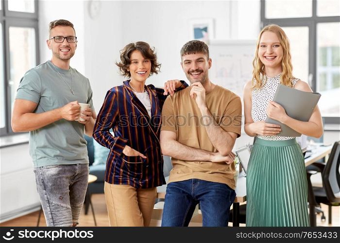startup, corporate and people concept - happy business team at office. happy business team at office