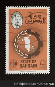 STATE OF BAHRAIN - CIRCA 1980: Stamp printed in the state of Bahrain shows a a map op the land, circa 1980