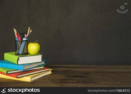 stationary apple pile books table. High resolution photo. stationary apple pile books table. High quality photo