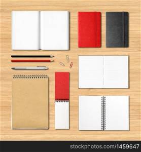 stationery books and notebooks mockup template isolated on wooden desk background. stationery books and notebooks on a wooden background
