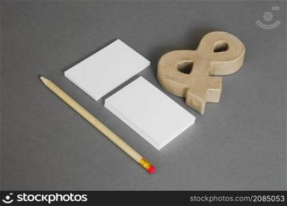 stationery concept with pencil ampersand