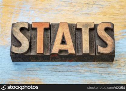 stats (statistics) word abstract in vintage letterpress wood type printing blocks