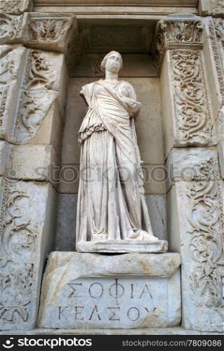 Statue and facade of library in Ephesus, Turkey