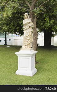 Statue at Bang Pa-In Palace, the summer palace of the Thai king in Ayutthaya, Thailand