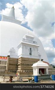 Statue Buddha in the shrine near big stupa iin Anuradhapura, Sri Lanka
