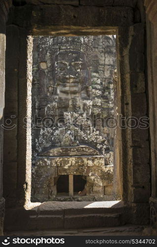 Statue carved at temple, Bayon Temple, Angkor Thom, Siem Reap, Cambodia