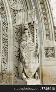 Statue carved on a building, Peace Tower, Parliament Hill, Ottawa, Ontario, Canada