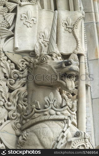 Statue carved on a building, Peace Tower, Parliament Hill, Ottawa, Ontario, Canada