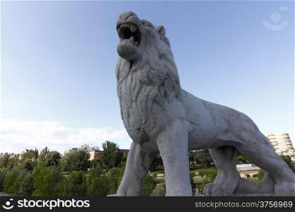statue in stone of a lion