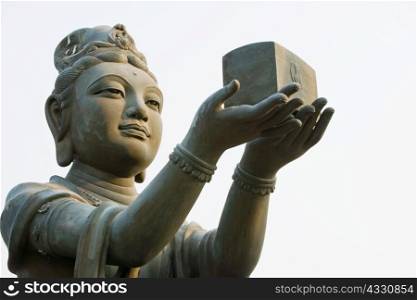 Statue near tian tan buddha