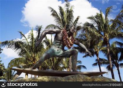 Statue of a man on a surfboard, Waikiki Beach, Honolulu, Oahu, Hawaii Islands, USA