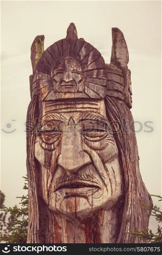 statue of an indian head totem