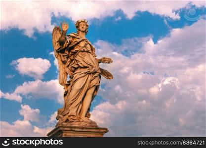 Statue of Angel on Saint Angel Bridge, Rome, Italy. Marble statue of Angel with the Nails at sunset, one of the ten angels on Saint Angel Bridge, symbols of Christ&rsquo;s Passion, Rome, Italy
