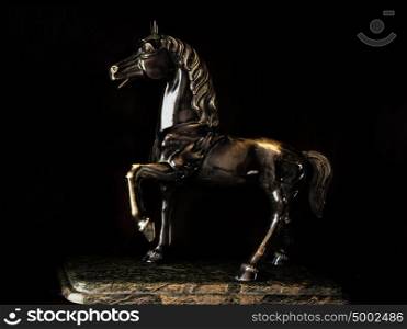 statue of arabian horse from metal
