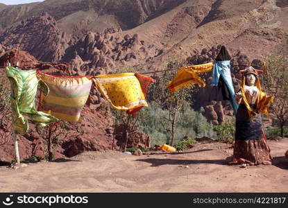 Statue of berber woman woth traditional clothes in Morocco