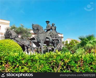 statue of carriage spanish horses in Jerez da la Frontera. Andalusia, Spain sunny day