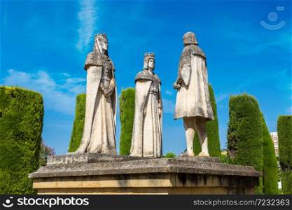 Statue of Christian kings Ferdinand and Isabella and Christopher Columbus in Alcazar de los Reyes Cristianos in Cordoba, Spain