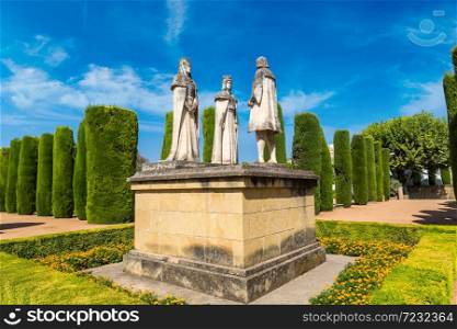 Statue of Christian kings Ferdinand and Isabella and Christopher Columbus in Alcazar de los Reyes Cristianos in Cordoba, Spain