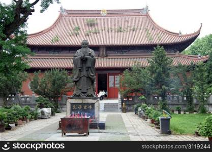 Statue of Confucius inside temple in Suzhou, China