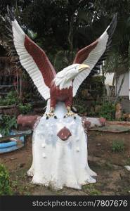 Statue of eagle in the garden of buddhist monastery, Thailand