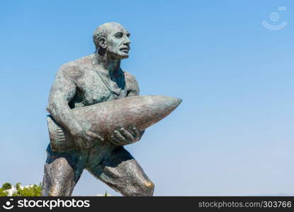 Statue of famous Turkish Corporal, Seyit Cabuk (Seyit Onbasi) carrying an artillery piece at Canakkale Martyrs' Memorial, Turkey.in Canakkale,Turkey