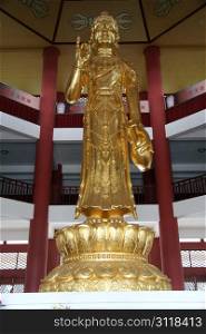 Statue of goddes Guanyin inside temple in Dali, China