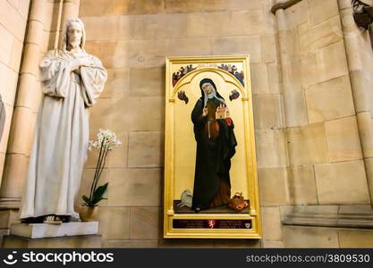 Statue of Jesus Christ and painting of Saint Agnes of Bohemia inside Saint Vitus Dome in Prague