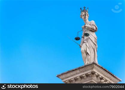 Statue of Justice, on the background of the sky