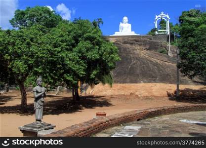 Statue of King Devanampiyatissa and Buddha in Mihintale, Sri Lanka