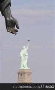 Statue of Liberty and Another Statue Hand