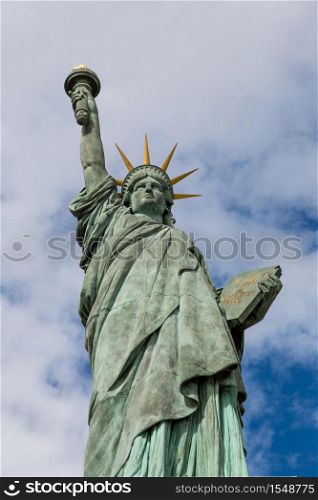 Statue of liberty in a beautiful summer day