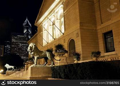 Statue of lions in front of a building, Art Institute of Chicago, Chicago, Illinois, USA