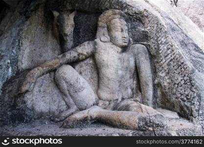Statue of man with head of horse in the Isurumuniya Rock Temple in Anuradhapura