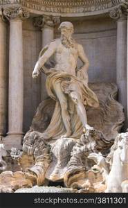 Statue of Neptune at the Trevi Fountain in Rome, Italy