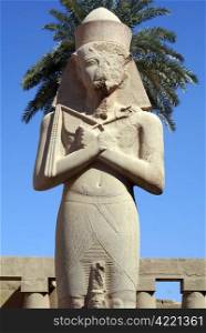 Statue of pharaoh in Karnak temple in Luxor, Egypt